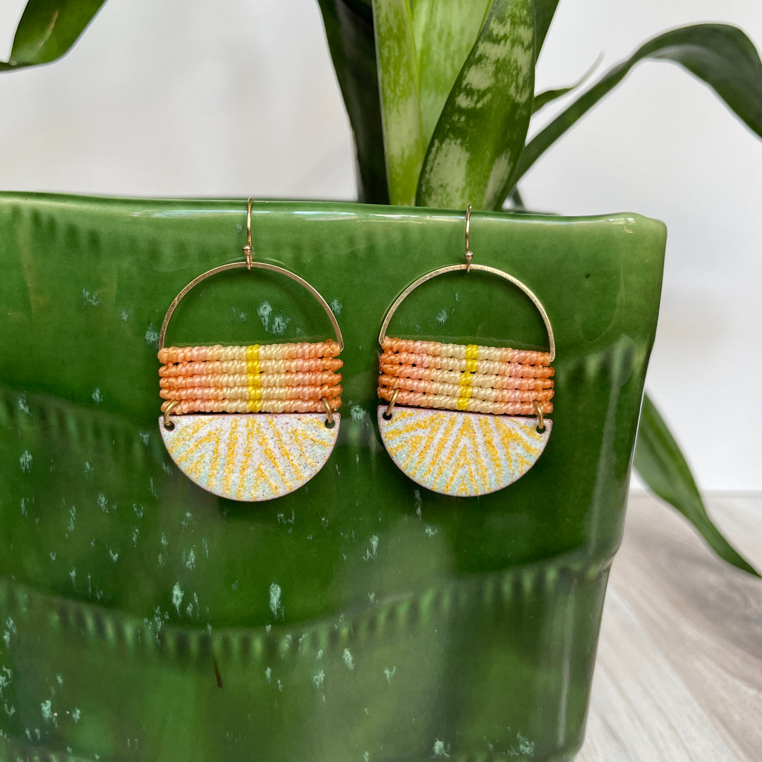 Macrame and enamel earrings in orange, aqua and yellow.