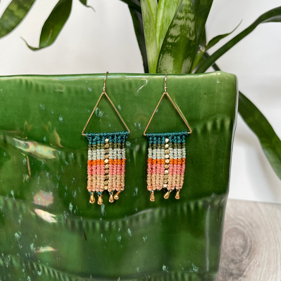 Macrame and beaded earrings in teal, aqua and orange.