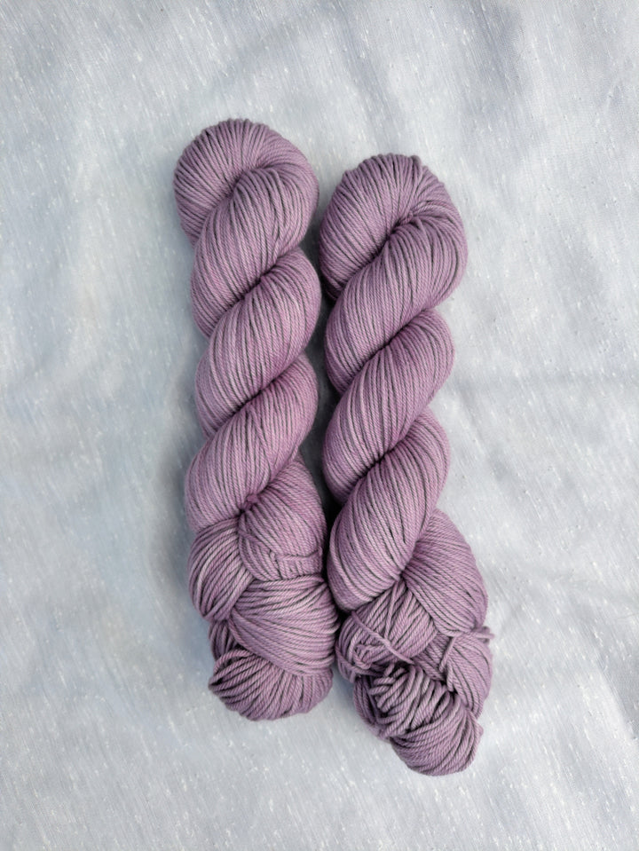 Pale purple semisolid yarn.