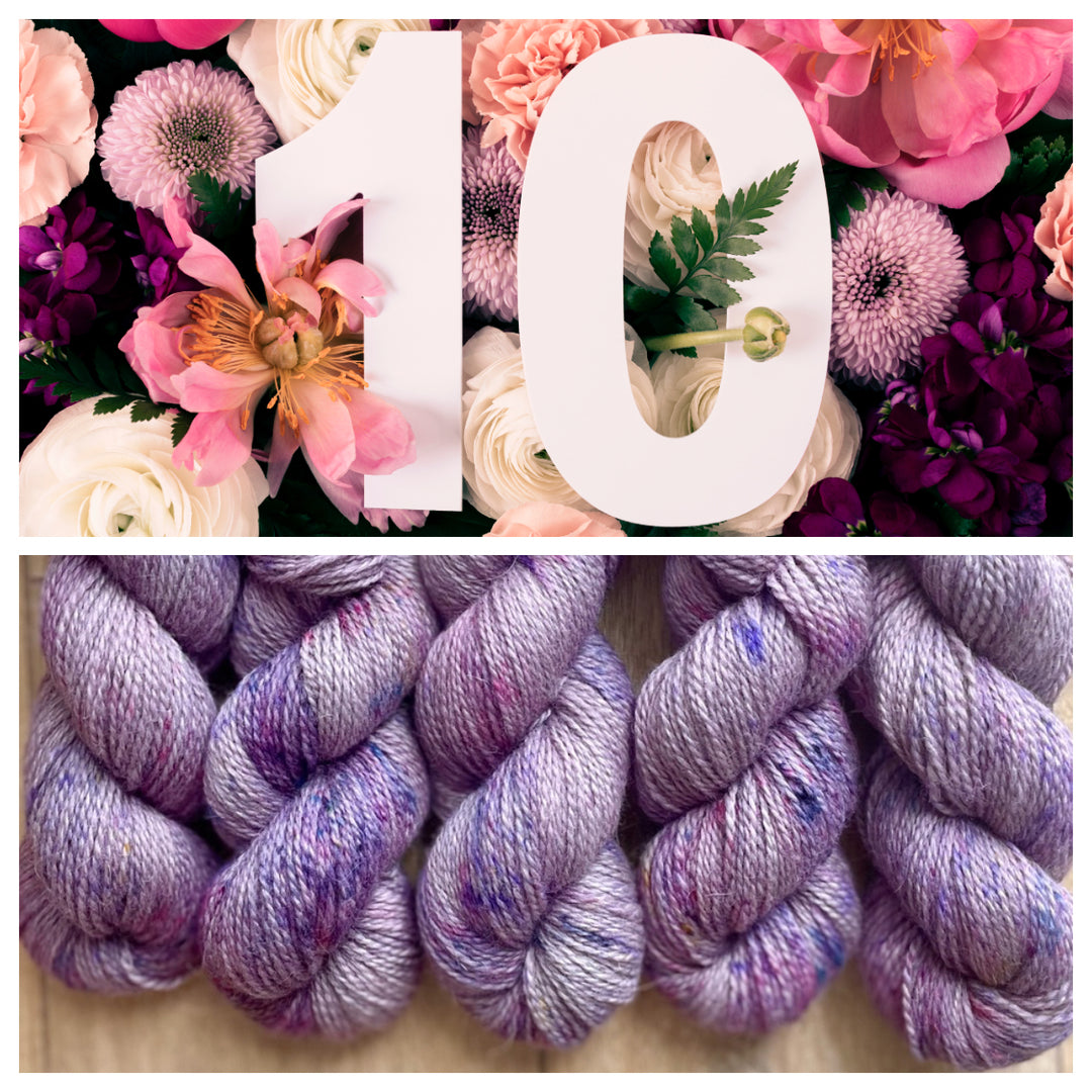 A large, bold number "10" placed over a vibrant floral background. The flowers are a mix of pink, purple, and white blooms, including roses, peonies, and dahlias, with some green foliage. Four skeins of hand-dyed yarn in a soft lavender color with speckles of pink and purple throughout.