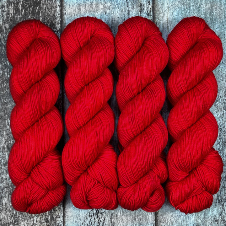 Skeins of bright red yarn.