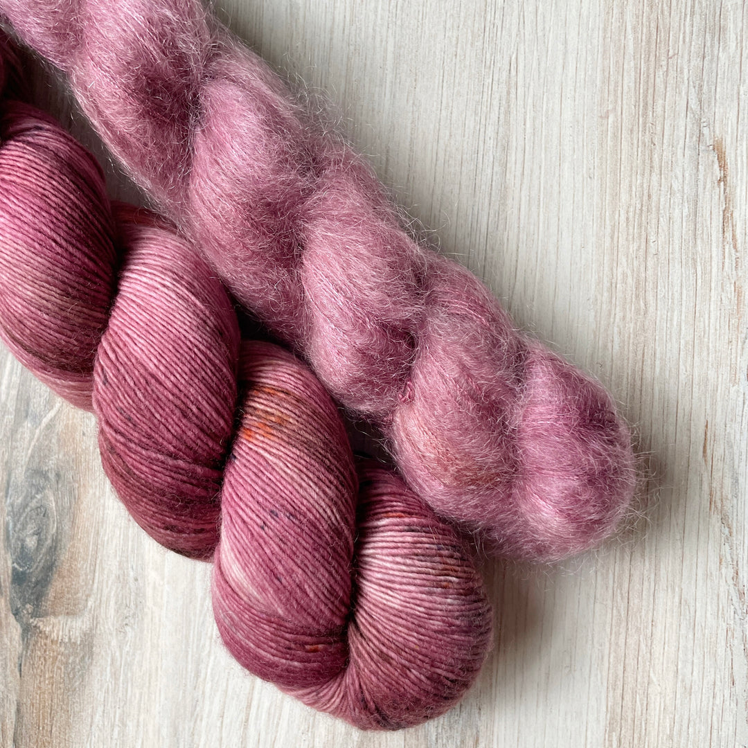 Dark pink yarn.