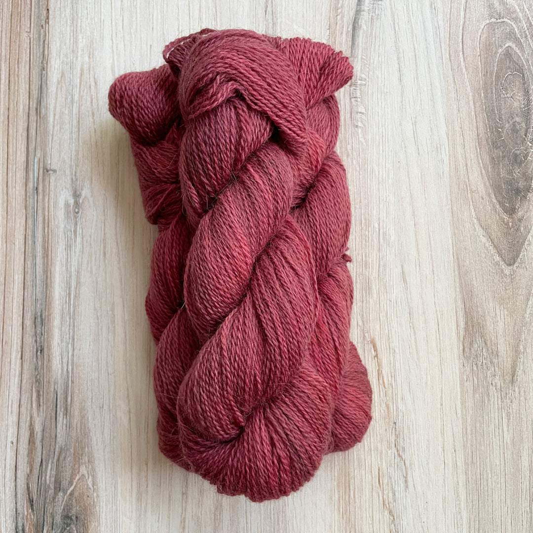 Dark pink yarn.