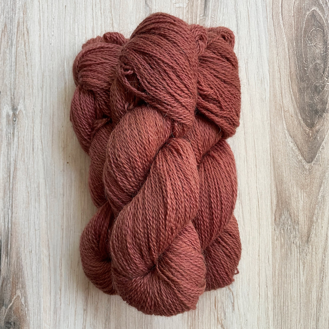 Pink red yarn.
