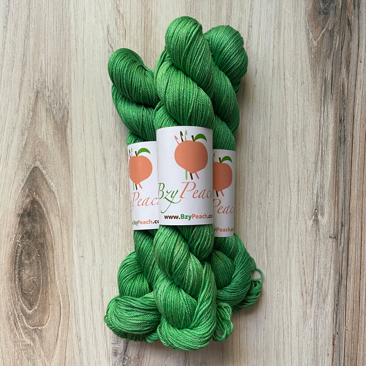 Skeins of green yarn.