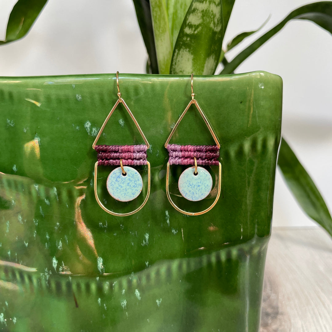 Macrame and enamel earrings in purple and aqua.
