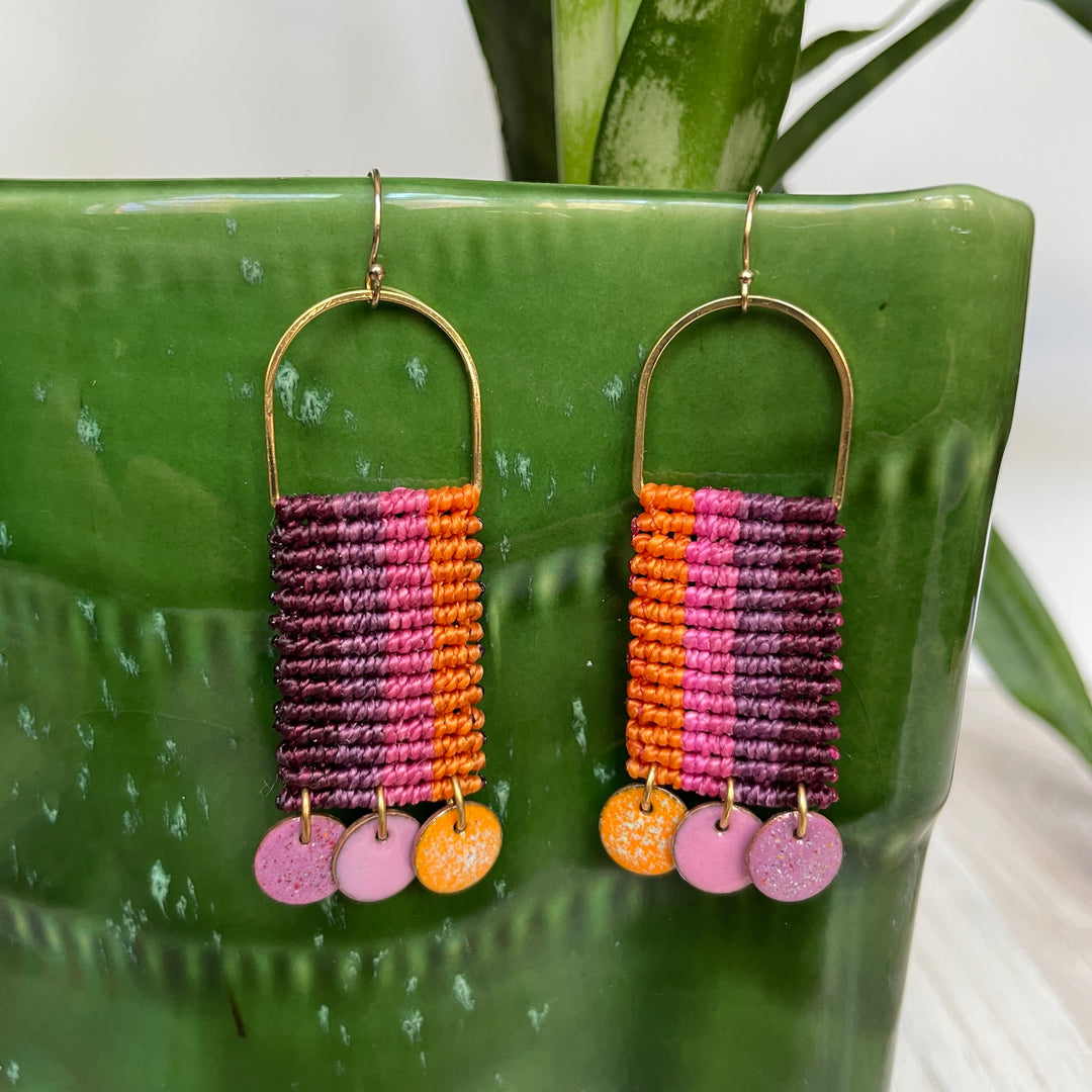 Macrame and enamel earrings in purple, pink and orange.