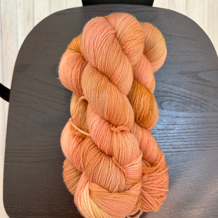 Skeins of orange yarn.