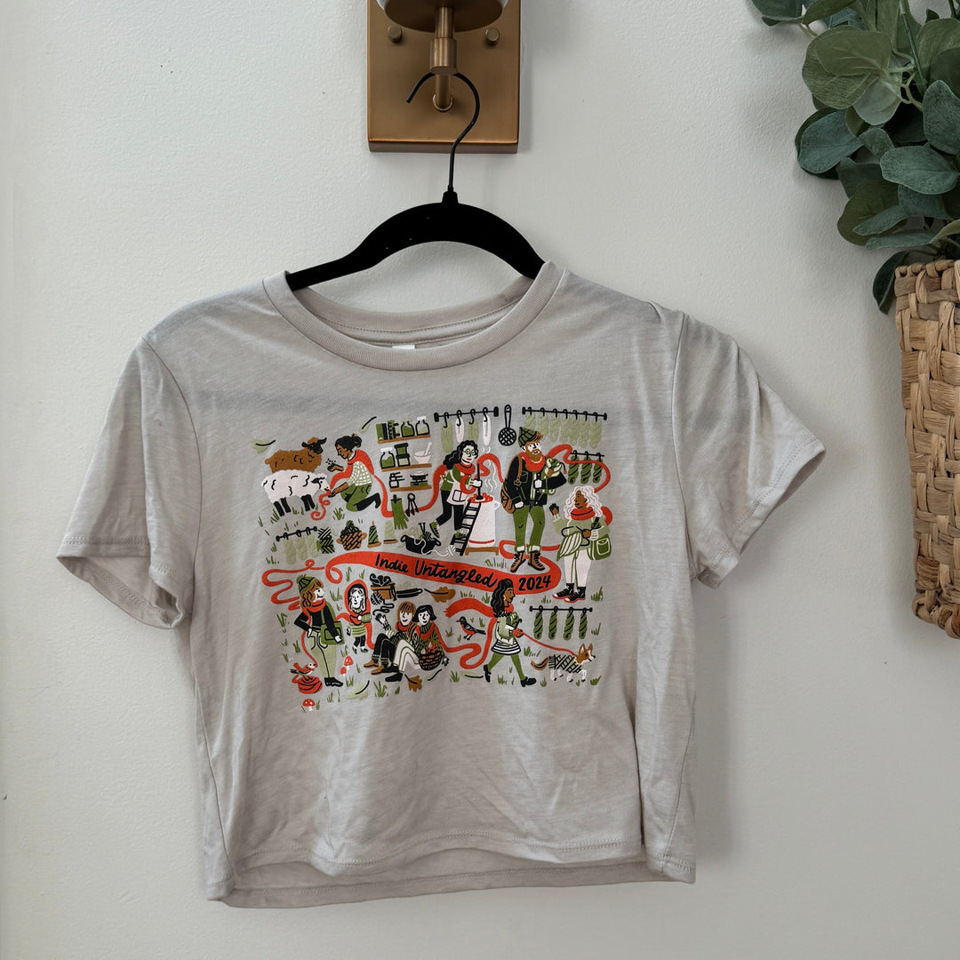 A beige t-shirt with the Indie Untangled 2024 design.