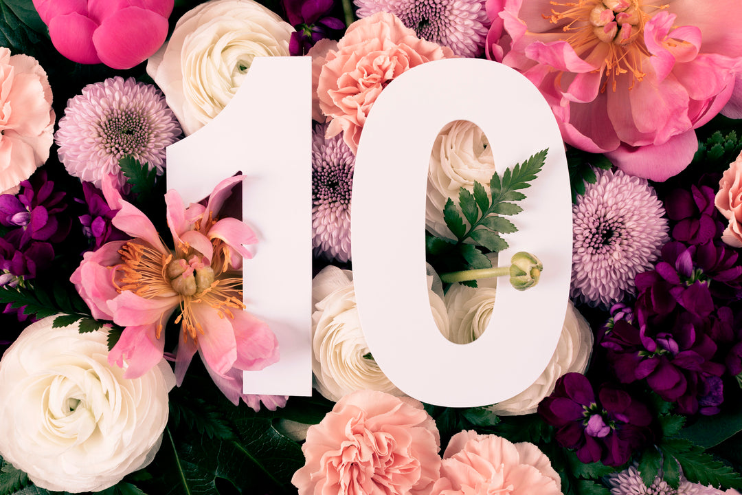 Pink, white and purple flowers with the number 10.