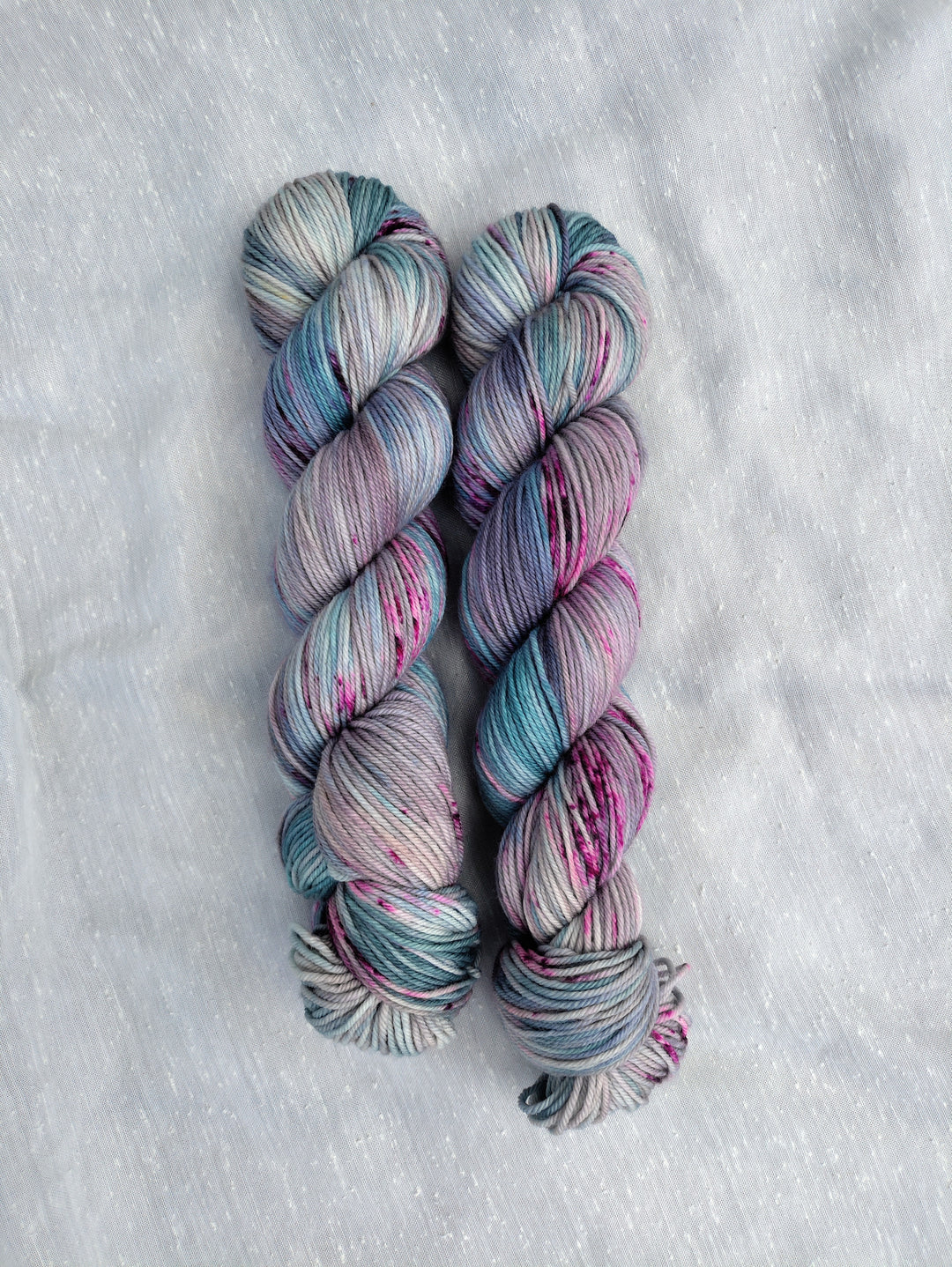 Blue, purple and green speckled yarn.
