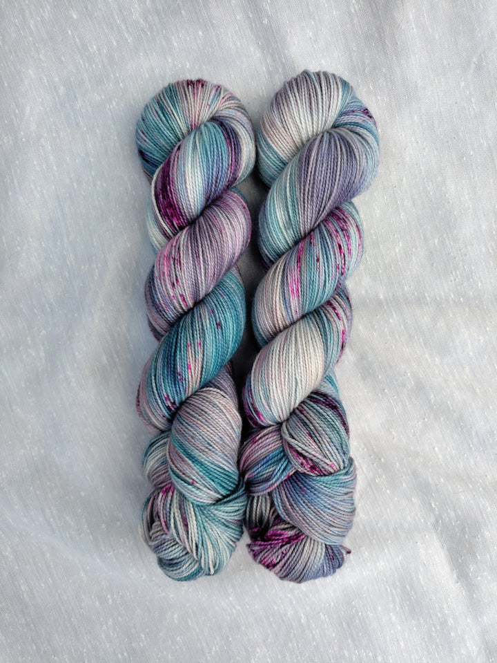 Blue, purple and green speckled yarn.