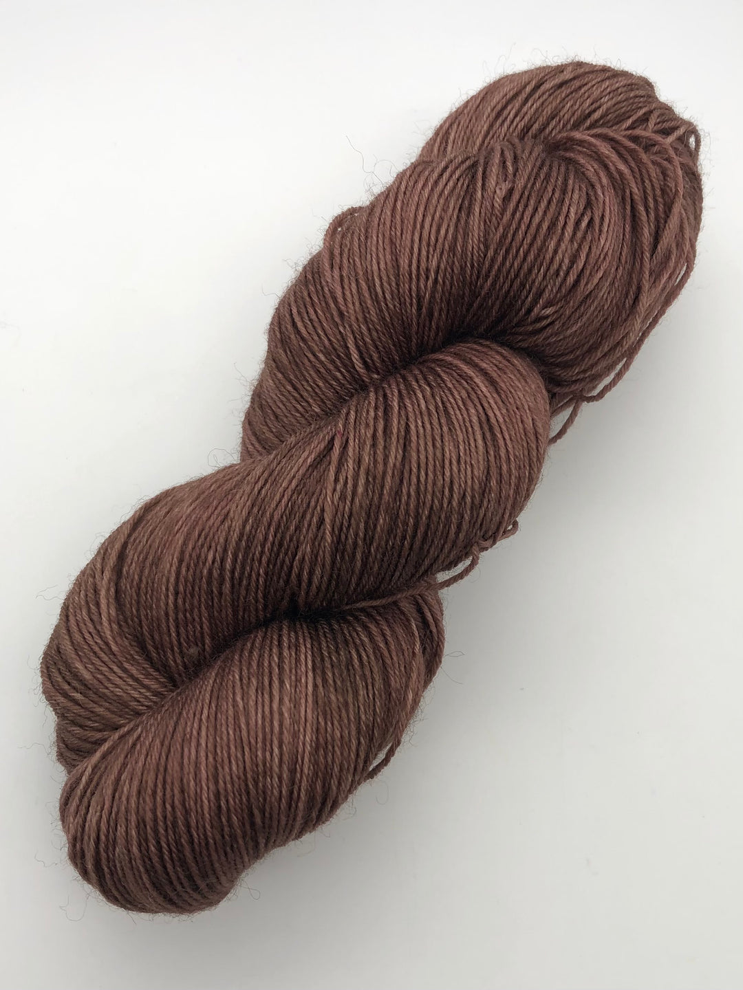 A skein of brown yarn.