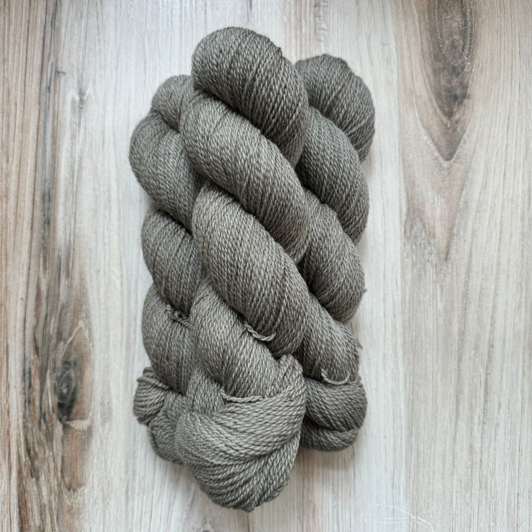 Skeins of gray yarn.