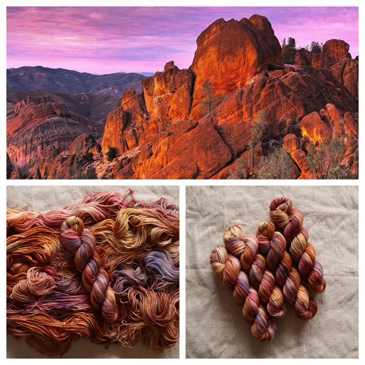 Vibrant rock formations at sunset. Hand-dyed yarn inspired by rugged landscapes. A bundle of skeins in warm, earthy hues.