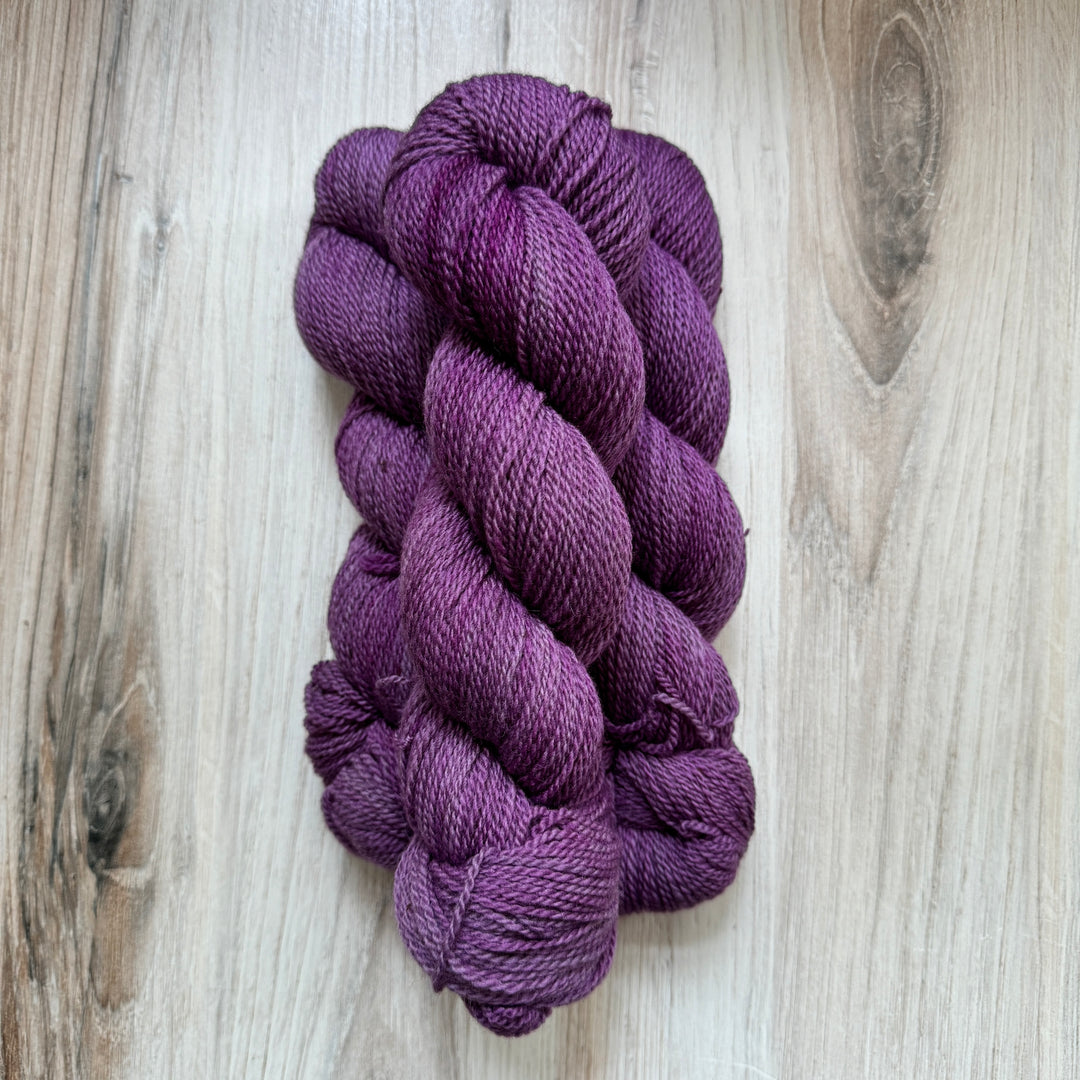 Skeins of purple yarn.