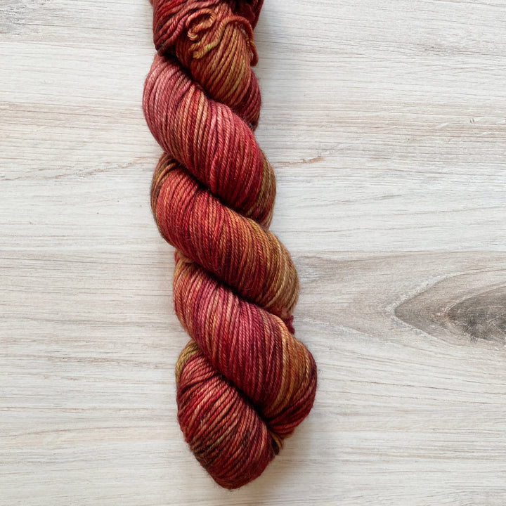 A skein of red and green yarn.