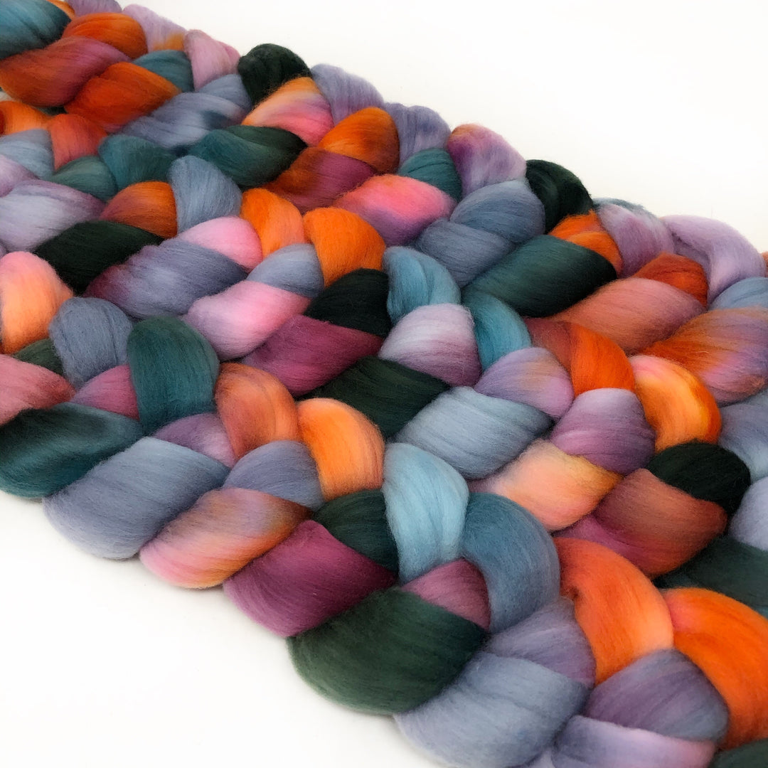 Purple, orange and green braids of fiber. 