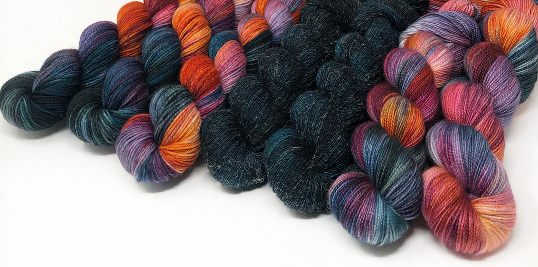 purple, orange and green yarn
