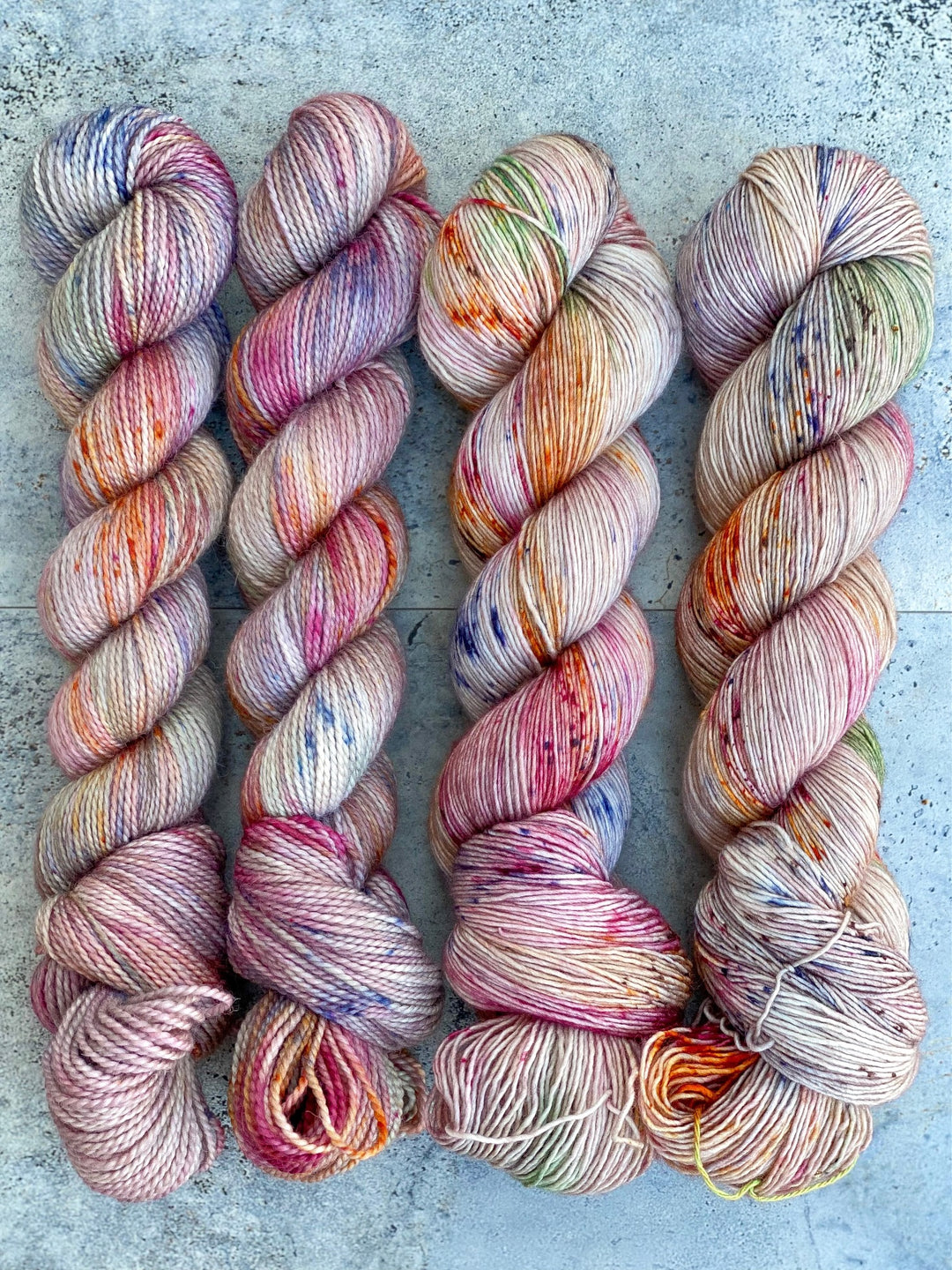 Pink, green and gold speckled yarn.