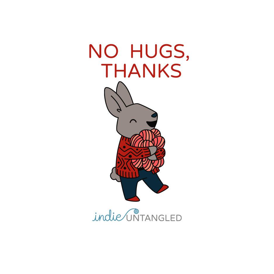 A rabbit wearing a red sweater and the words No hugs, thanks.