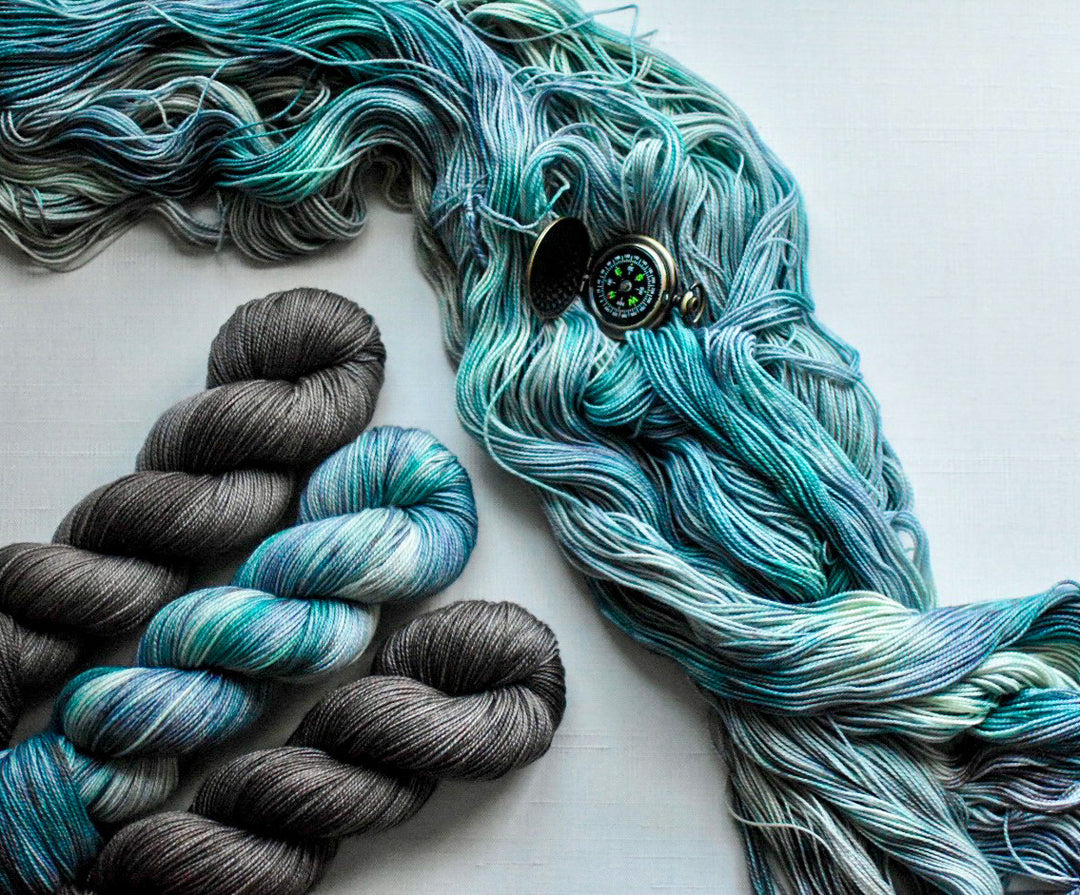 Yarn in aqua and gray.