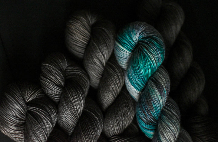 Yarn in gray and aqua.