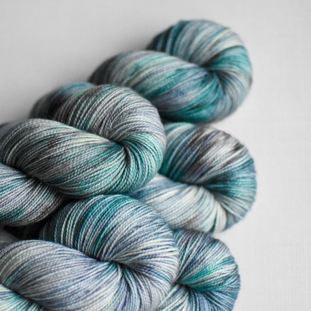 Gray and aqua yarn.