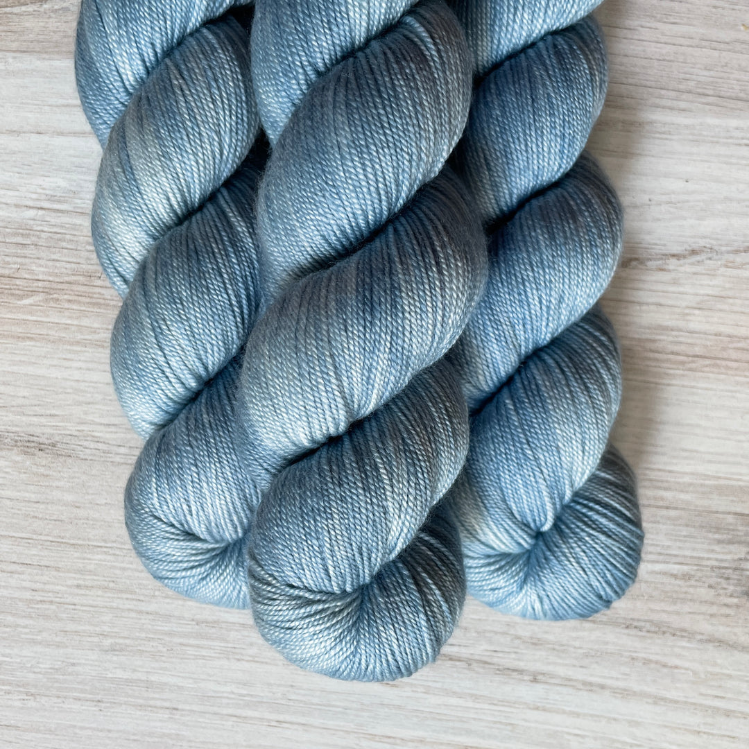 Pale blue yarn.
