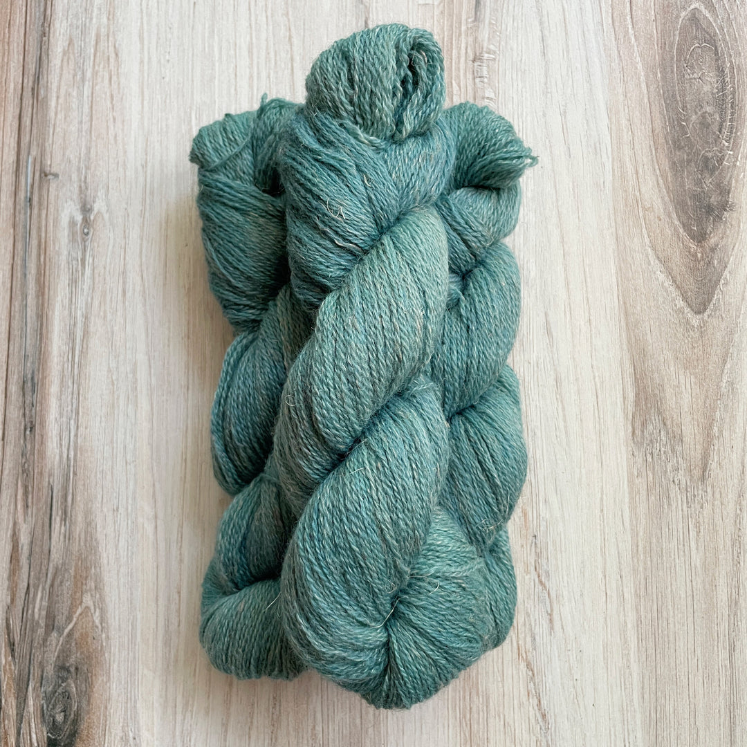 Blue green yarn.