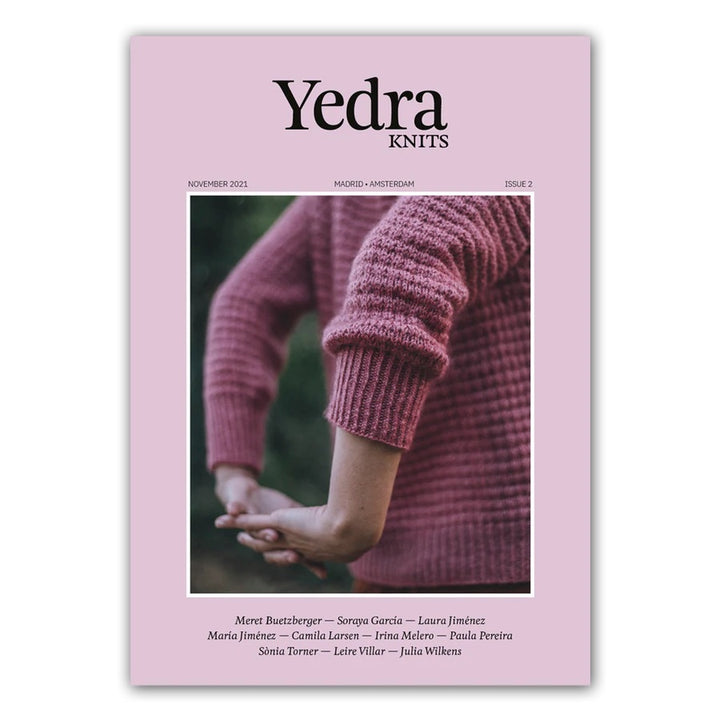 The cover of Yedra Knits magazine, which features the back of a pink textured sweater.