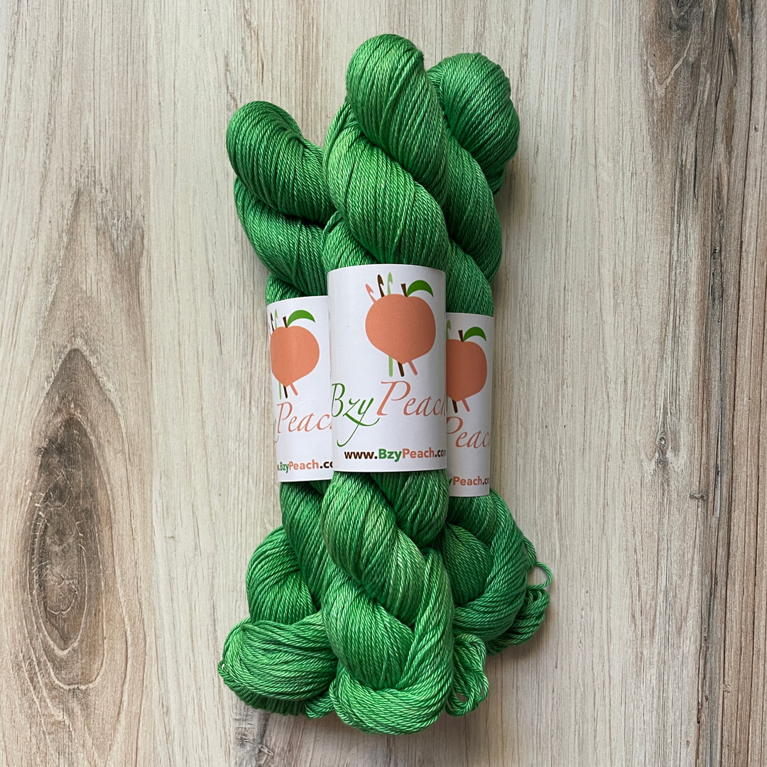 Skeins of green yarn. 